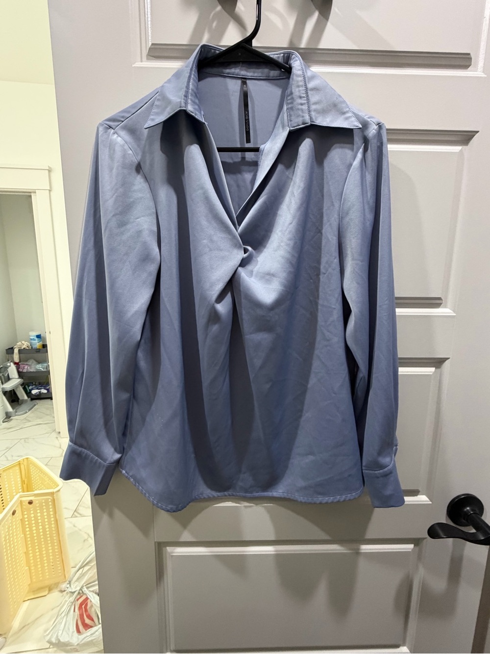 Woman’s Light Blue Twisted Front Shirt